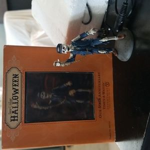 Department 56 Snow Village Halloween skeleton train conductor. "Time's-A-Wastin"